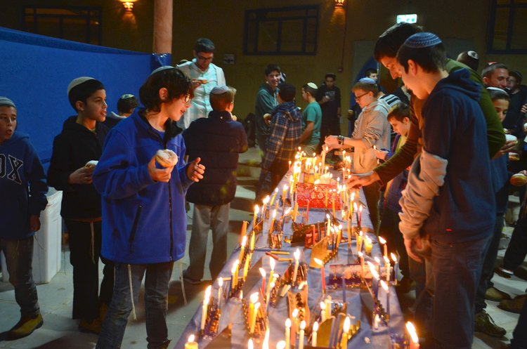 Bereaved Children Light a Candle at OneFamily Chanukah Camp Image Description